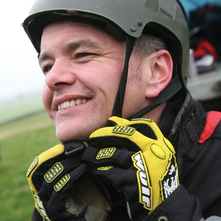 Close up of model fastening helmet.