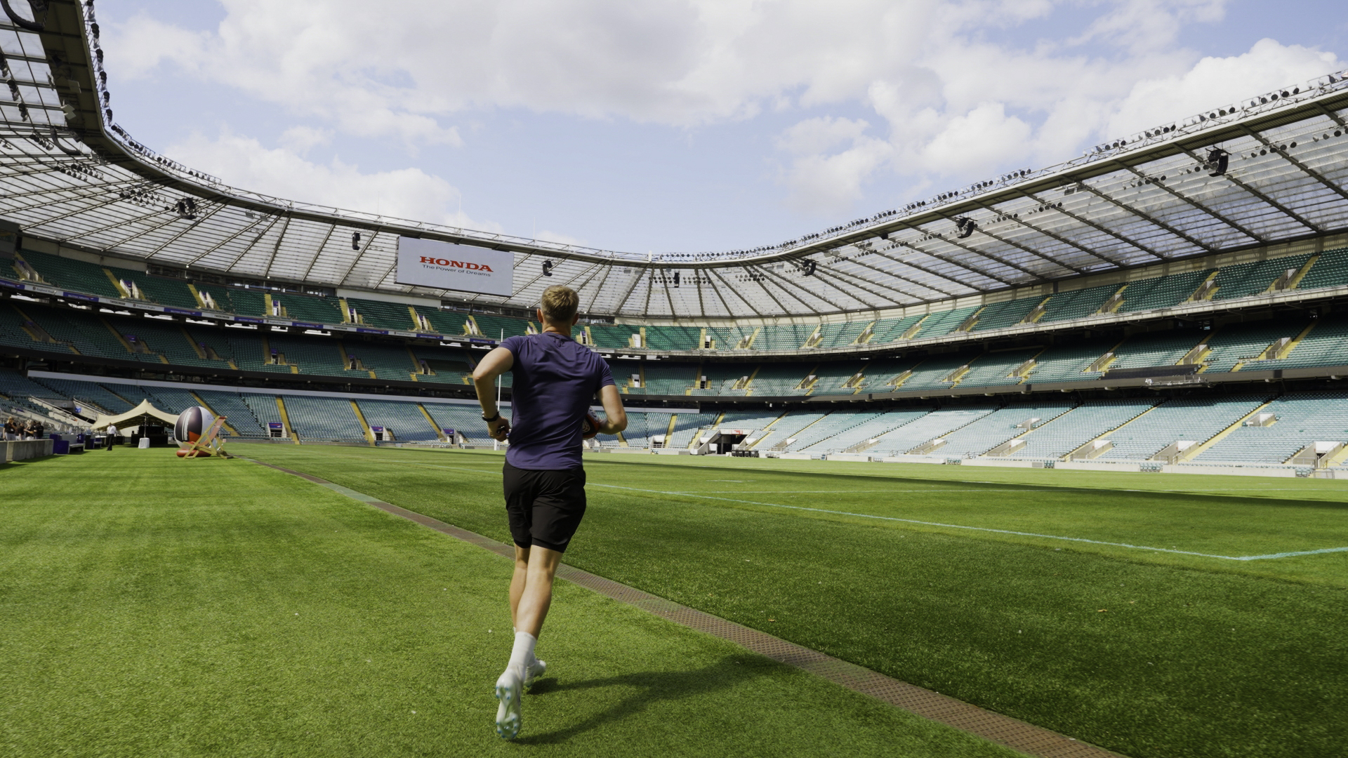 Ben Johns running onto the pitch