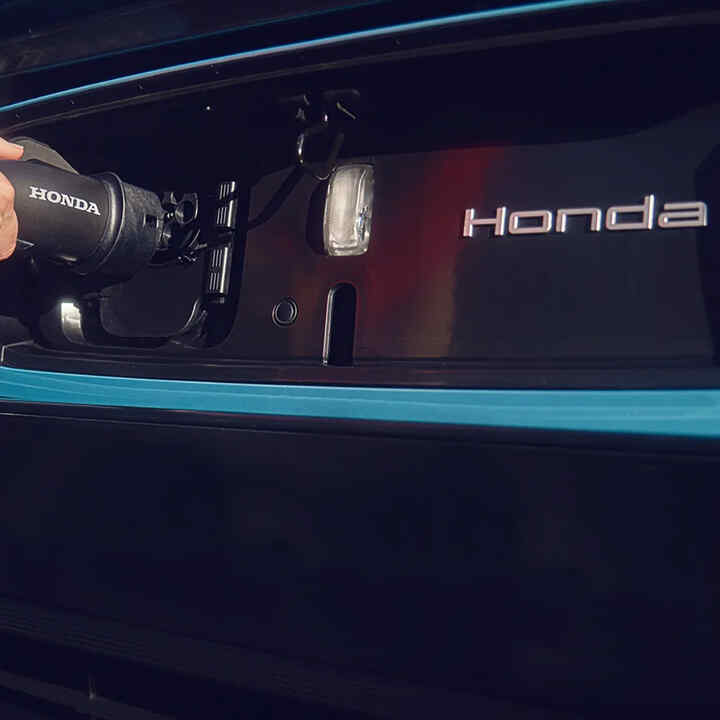 Close up of Honda Car using a charging