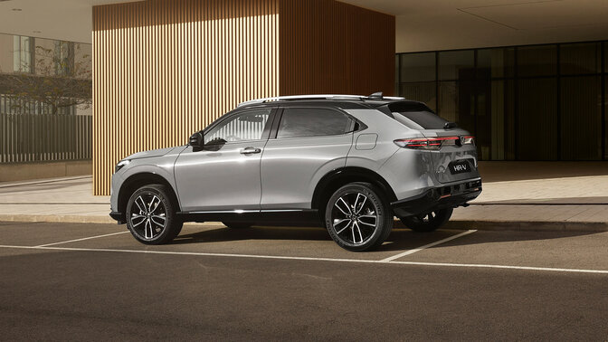 Rear facing Honda HR-V parked outside of building location