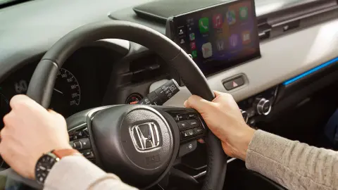 Close up of Hands on the Honda HR-V steering wheel