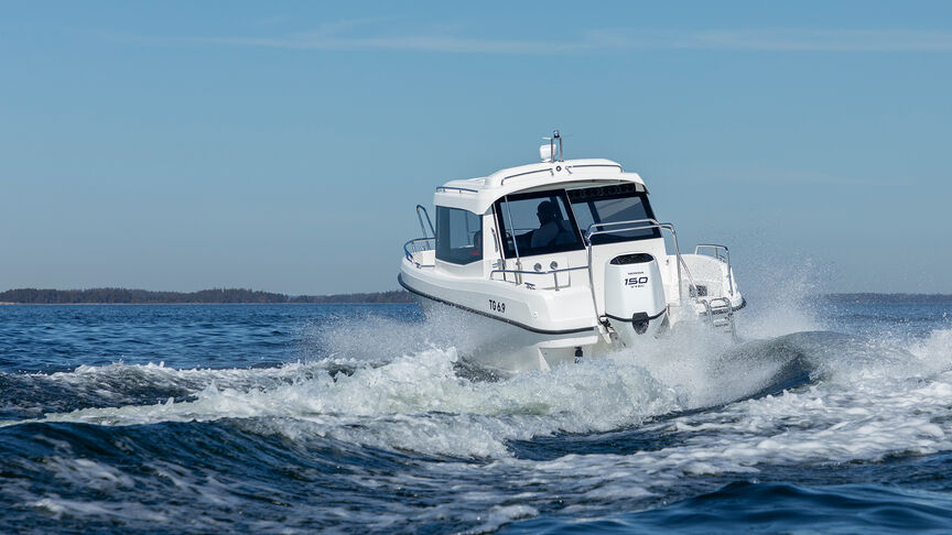 Couple on boat with a Honda BF115 engine. 