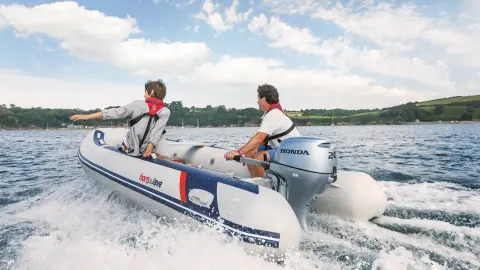 Two males on Honwave with a BF20 Engine in water location. 