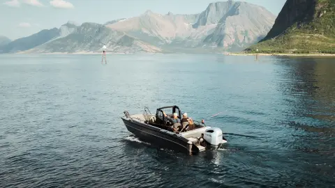 Two gentlemen fishing on a boat with a Honda BF200 engine.