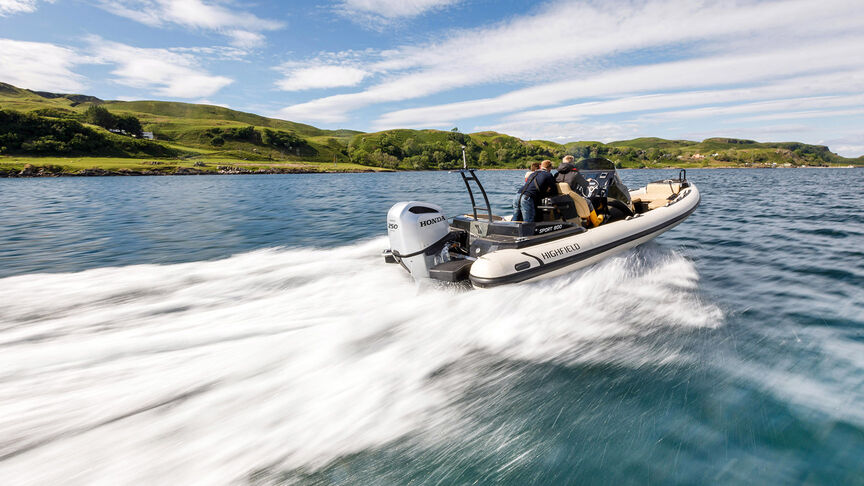 Couple on boat with a Honda BF200 engine. 