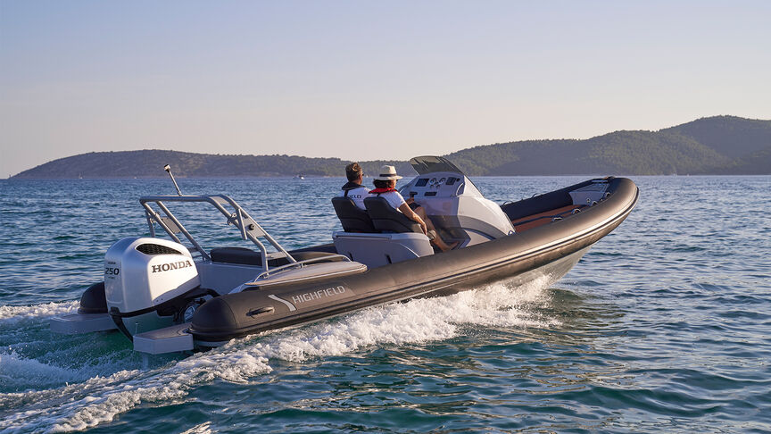 Couple on boat with a Honda BF200 engine. 