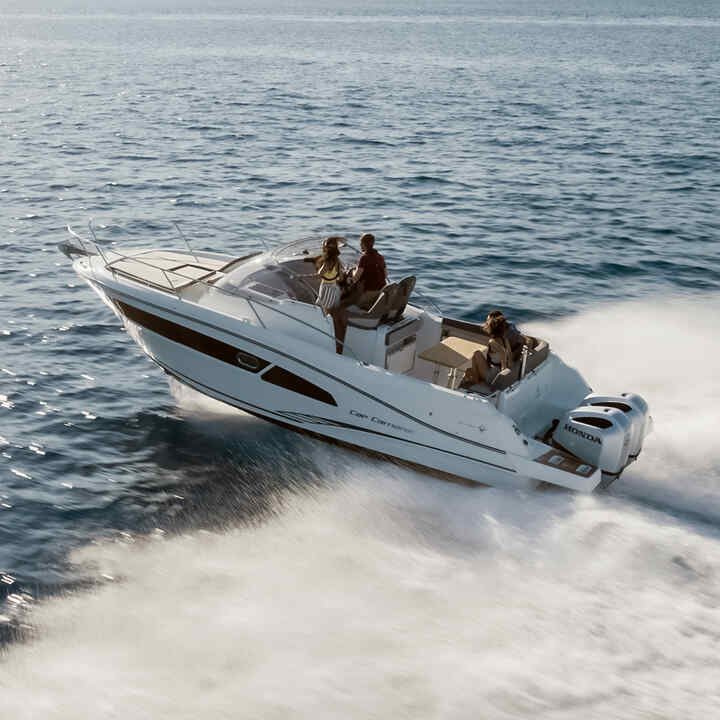 Gentleman on a boat using a Honda BF250 engine in ocean location.