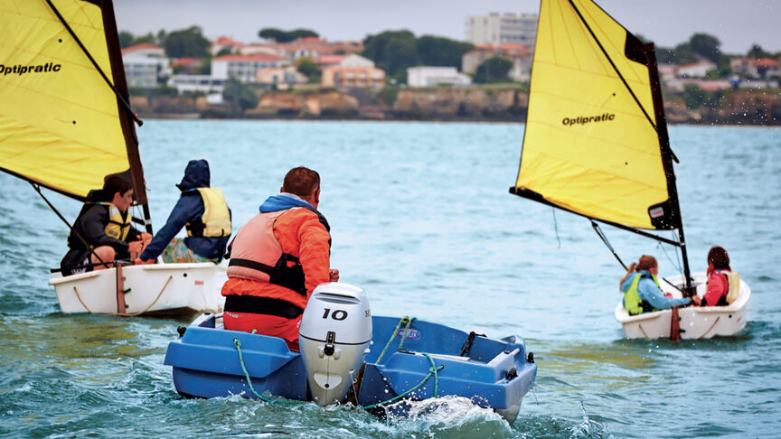 Models in boats in the sea showcasing BF10 engine.