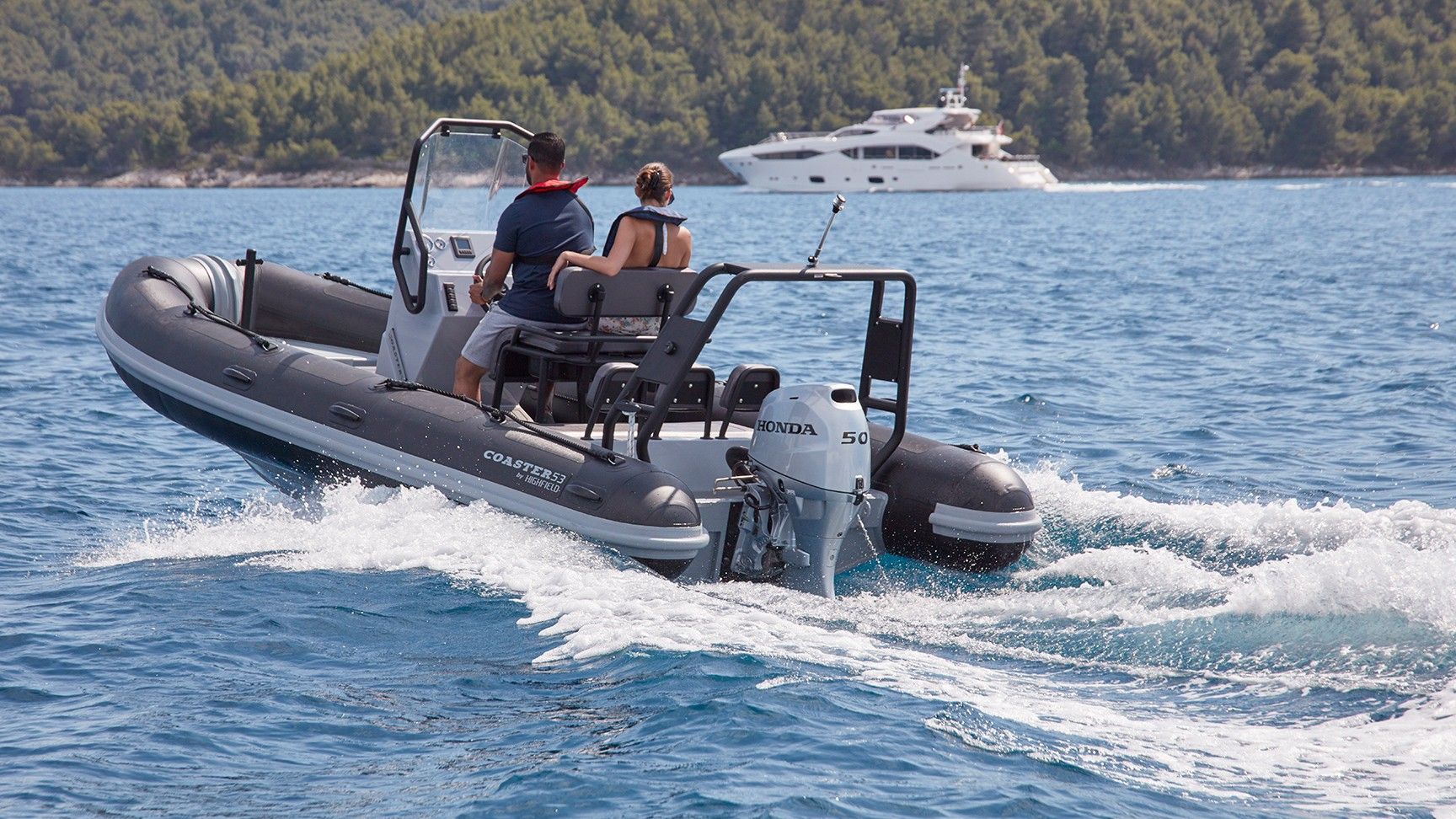 Woman and man on boat in the sea