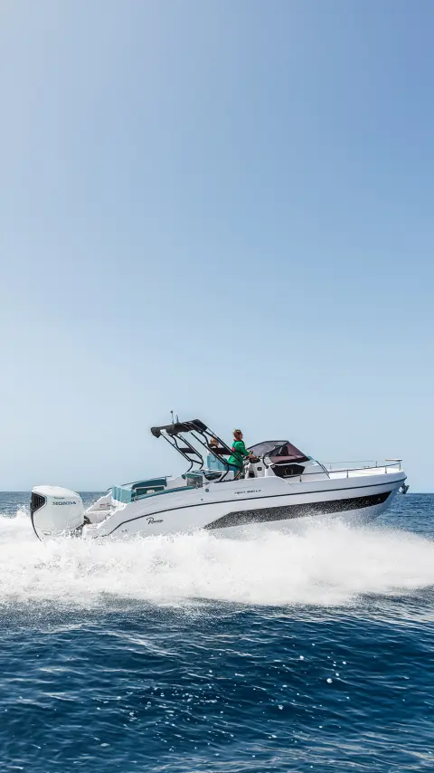 Boat on the water with Honda BF350 engine.  