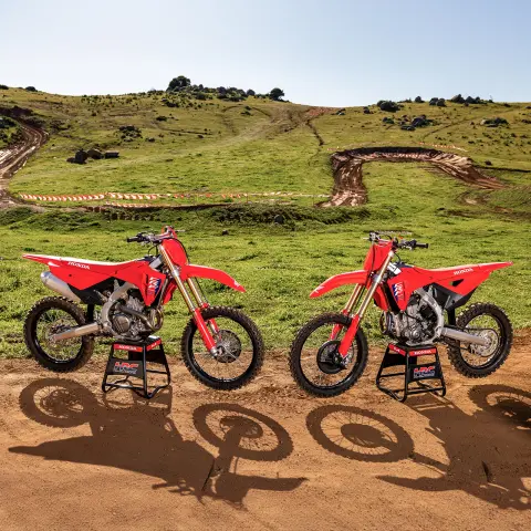 Honda CRF250R dynamic front on image on track with MX rider