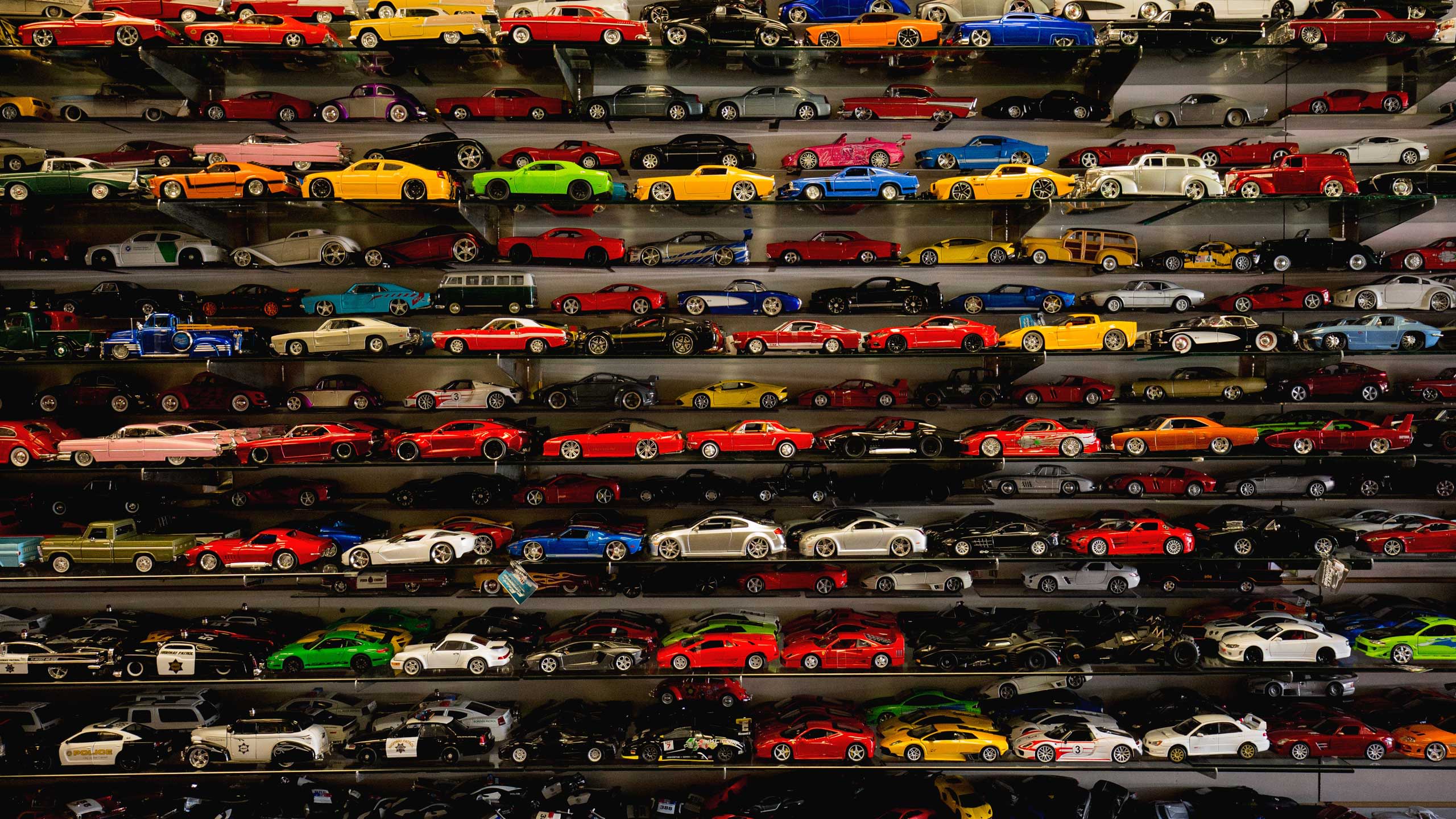 Collection. The collection. A lot of cars. Cars with lots of cars. Child`s collection of cars.